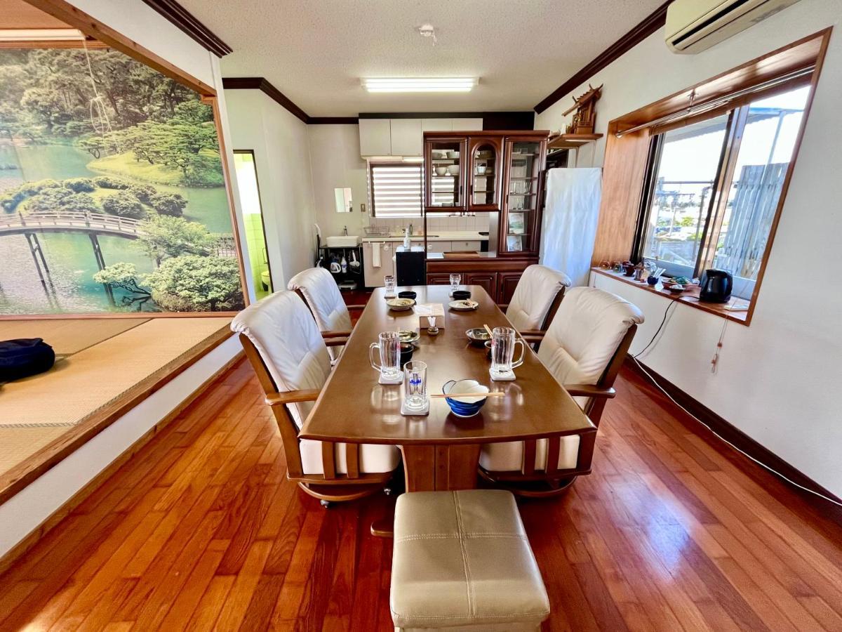 バーベキューもできる! 海と浜比嘉大橋を一望できる宿 Henza Exterior foto
